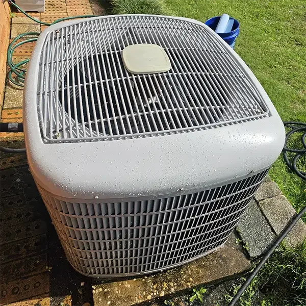 Residential outdoor condensing unit installed by Climate Masters, Inc. based in Spanish Fort