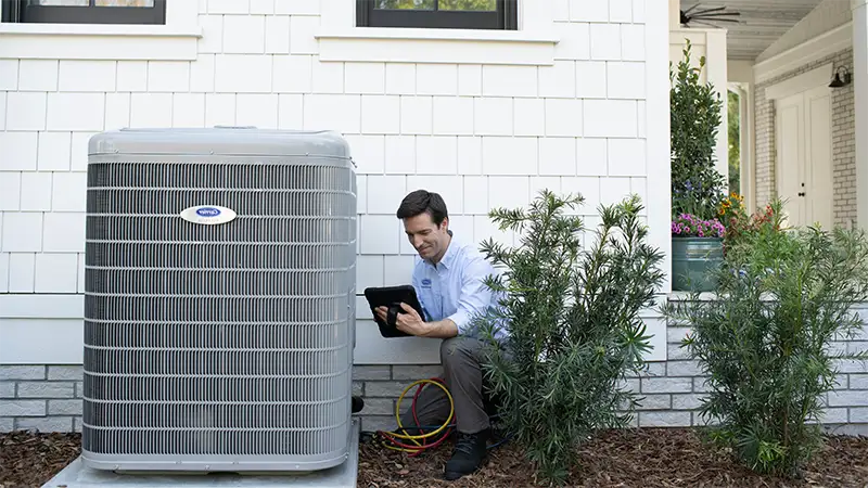 HVAC Technician checking for repairs | Home | Climate Masters Inc.