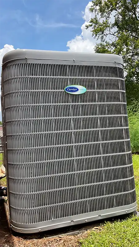 Close-up photo of a Carrier Brand HVAC air conditioner | Baldwin County | AC Repair | Climate Masters Inc.