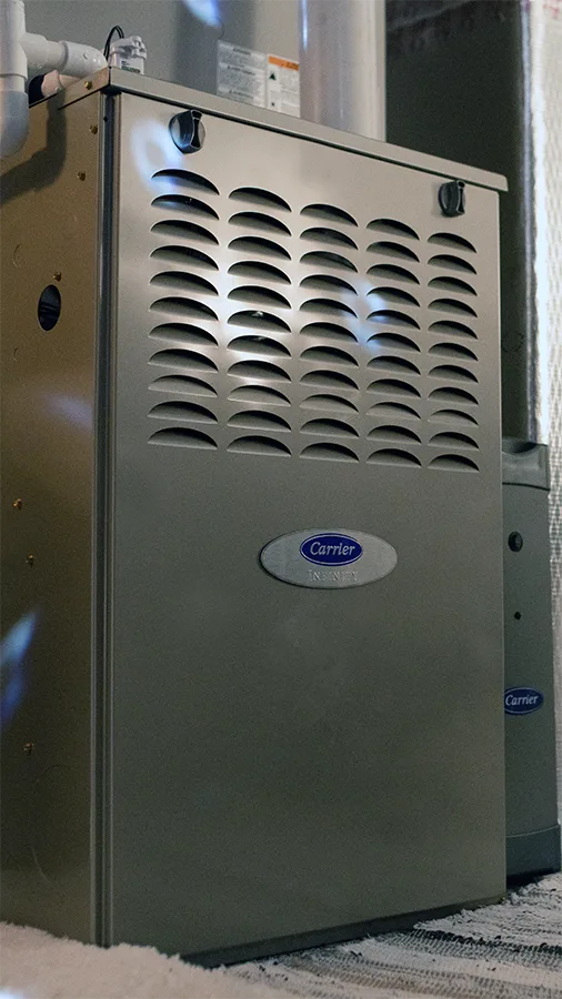 Close-up of a Carrier Furnace installed in home's basement | Furnace | Climate Masters Inc.