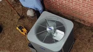 HVAC technician servicing air conditioner | Climate Masters INC | Air Conditioning Repair | Air Conditioning Repair Service