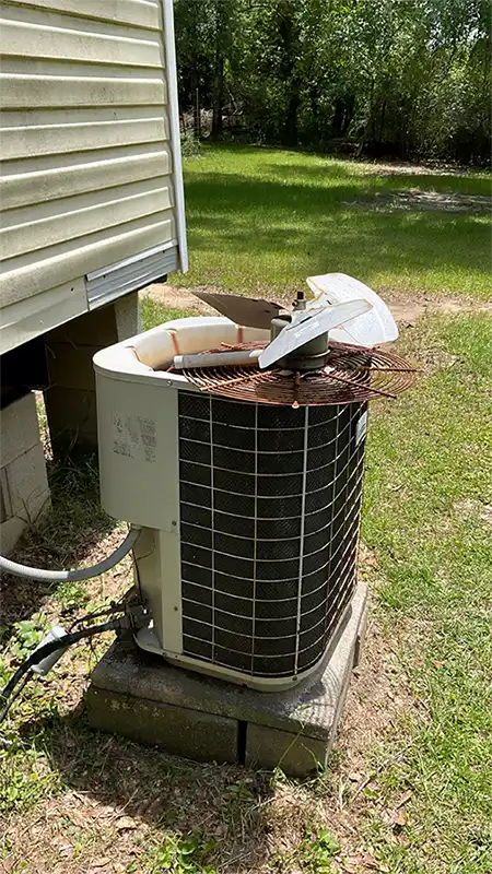 Older model air conditioning unit after being cleaned and maintenance side view | Bay Minette, AL | Climate Masters Inc.