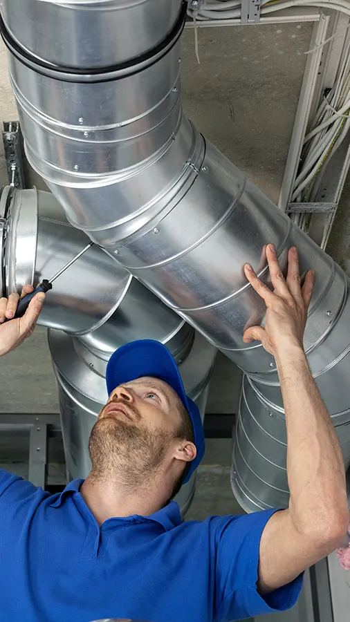 Duct Repair Technician replacing air duct | Climate Masters INC