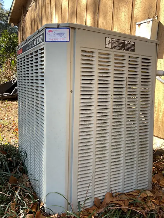 Servicing outdoor heat pump in Fairhope, AL | Furnace Repair Fairhope, AL | Climate Masters INC