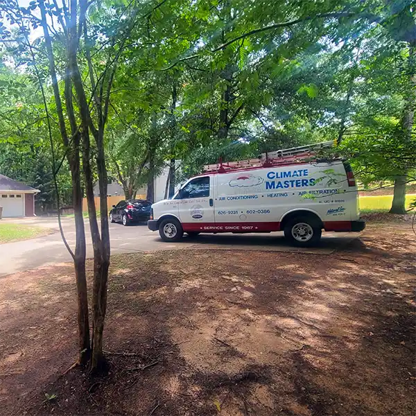 Service work van parked at customers home in Mobile, Alabama | Climate Masters Inc.