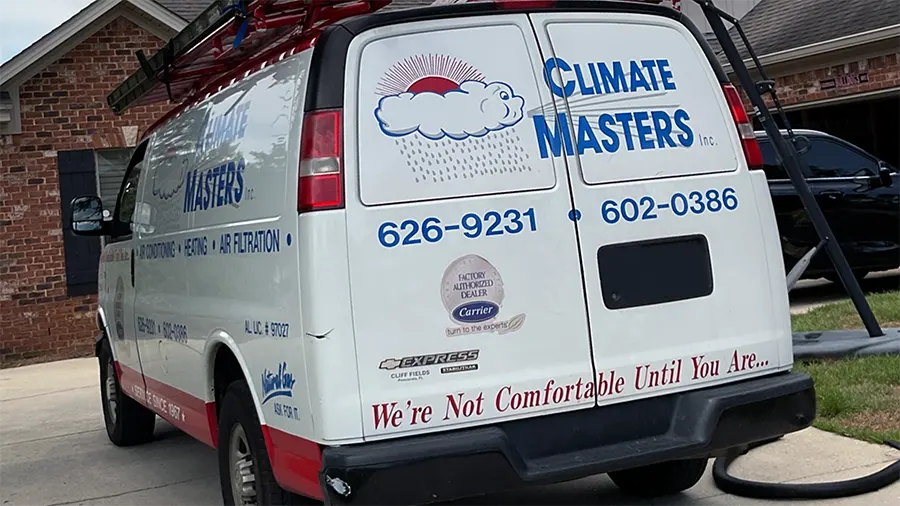 Work van in drive way of customers home | Climate Masters INC | HVAC Companies