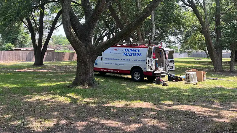 Service van parked in customers backyard for service call | Sales Appointment | Climate Masters Inc.