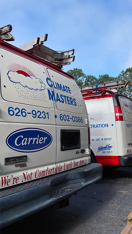 Climate Masters Inc. work vans lined up next to each other | Spanish Fort | AC Repair | Climate Masters Inc.